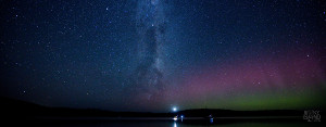 Awesome night sky panorama of the Milky Way and Aurora Australis above the Cape Bruny lighthouse and Labillardiere peninsula